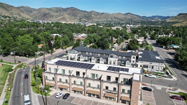 drone / aerial view featuring a mountain view