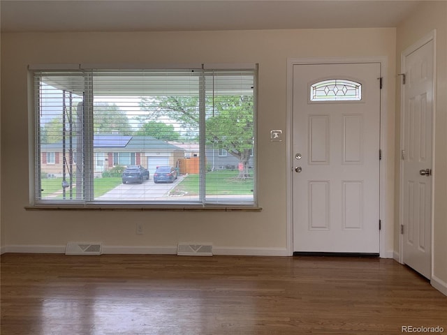 1152 S Eaton St, Lakewood, CO 80232 - entrance foyer featuring wood finished floors and baseboards