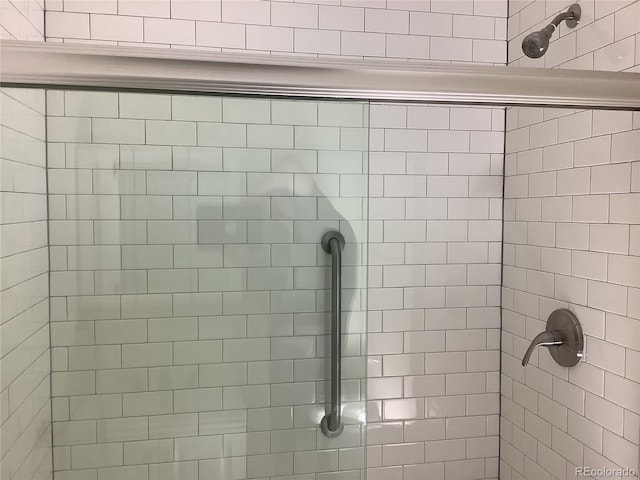 1152 S Eaton St, Lakewood, CO 80232 - full bathroom with tiled shower