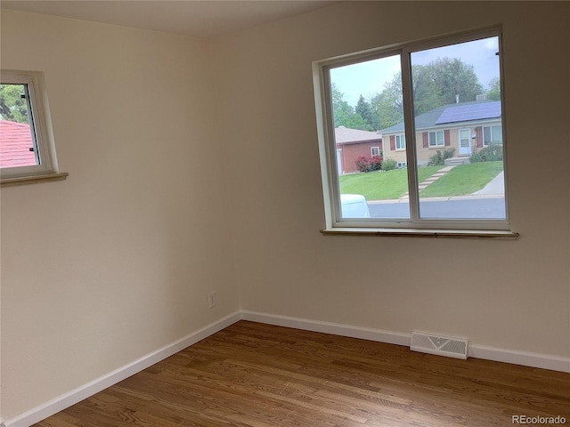 1152 S Eaton St, Lakewood, CO 80232 - spare room with baseboards and wood finished floors