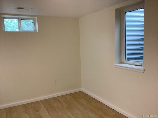 1152 S Eaton St, Lakewood, CO 80232 - unfurnished room featuring wood finished floors and baseboards