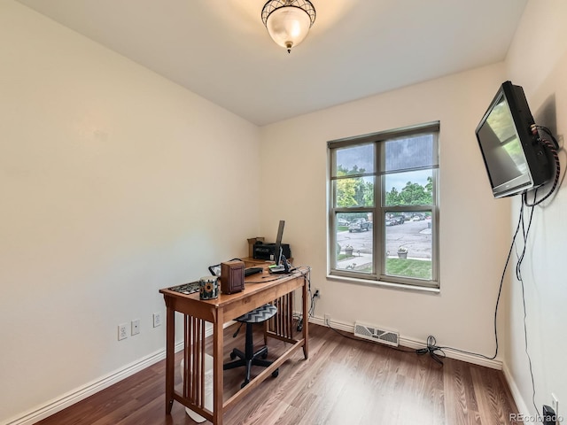 11707 W 65th Cir, Arvada, CO 80004 - office space featuring wood finished floors and baseboards