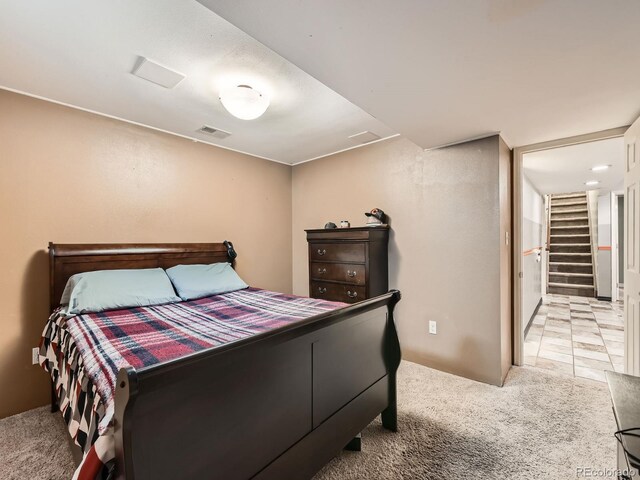 11707 W 65th Cir, Arvada, CO 80004 - bedroom featuring light colored carpet