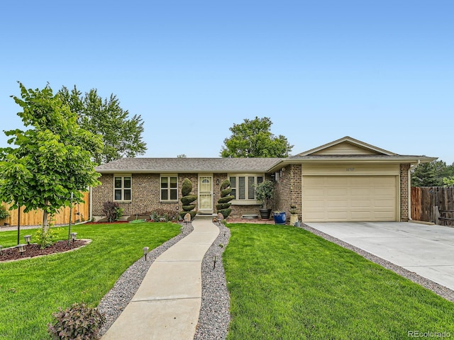 11707 W 65th Cir, Arvada, CO 80004 - ranch-style house with an attached garage, brick siding, driveway, and roof with shingles