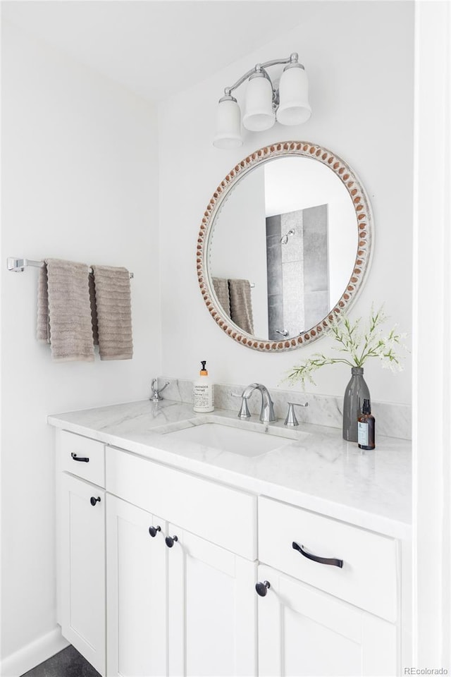 6982 Estes Dr, Arvada, CO 80004 - bathroom with vanity