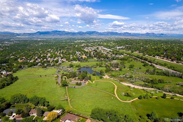 6982 Estes Dr, Arvada, CO 80004 - drone / aerial view of a water and mountain view