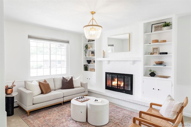6982 Estes Dr, Arvada, CO 80004 - living area with a chandelier, a fireplace, and built in shelves