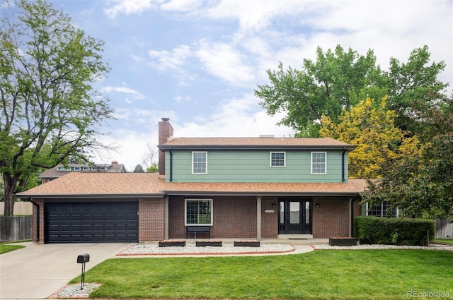 6982 Estes Dr, Arvada, CO 80004 - traditional home featuring a garage, concrete driveway, brick siding, and a chimney
