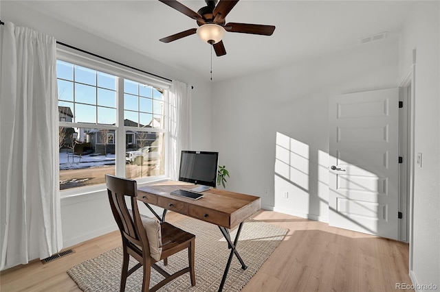 office area with ceiling fan and light wood-type flooring