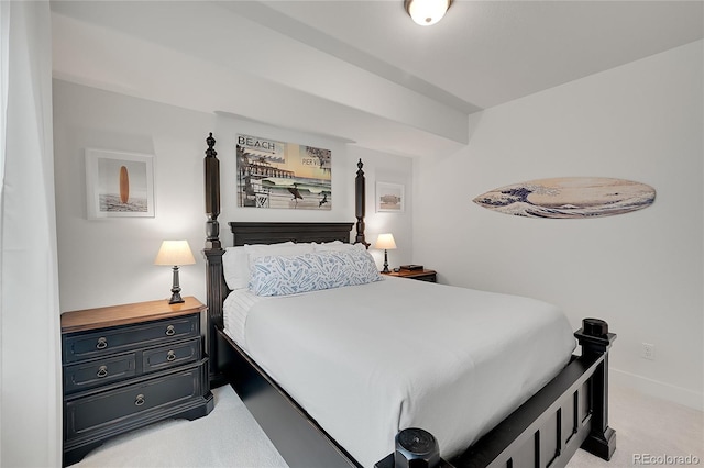 bedroom featuring light colored carpet