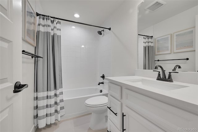 full bathroom with vanity, tile patterned flooring, toilet, and shower / bath combo with shower curtain