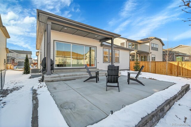 view of snow covered patio