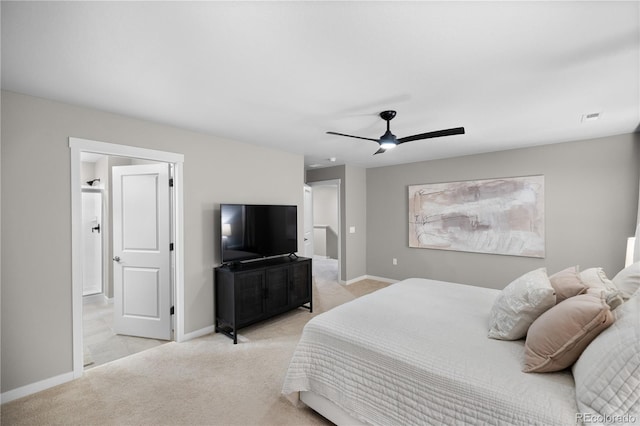 bedroom featuring light colored carpet and ceiling fan