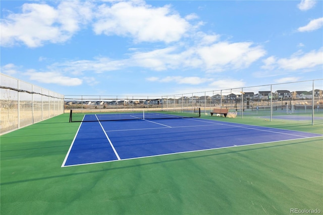 view of tennis court with basketball court