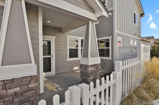 property entrance with a patio area