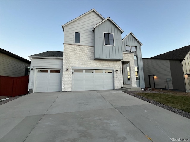 view of front of home with a garage