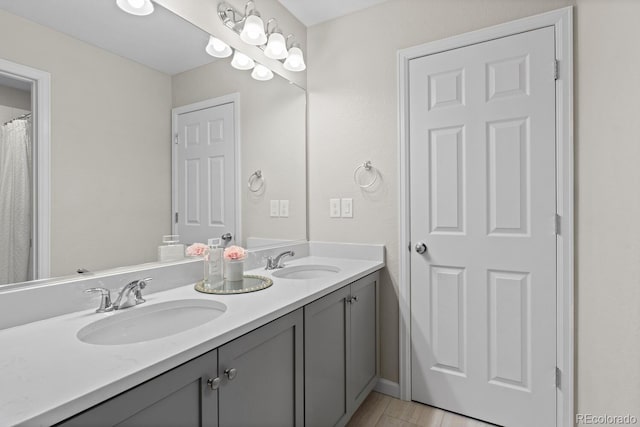 bathroom featuring double vanity