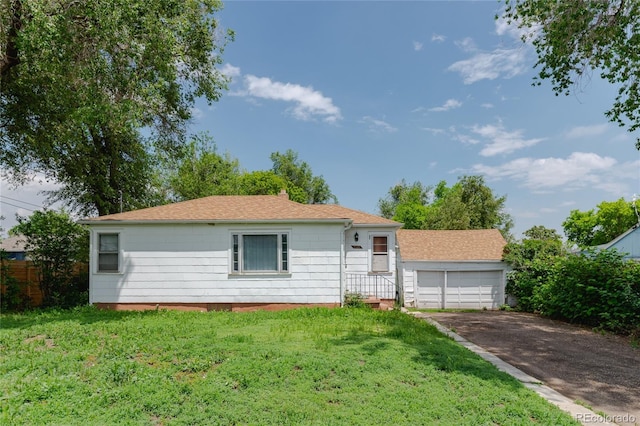2665 W College Ave, Denver, CO 80219 - ranch-style house with a front yard, a chimney, and a shingled roof
