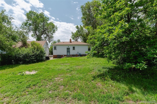 2665 W College Ave, Denver, CO 80219 - view of grassy yard featuring entry steps