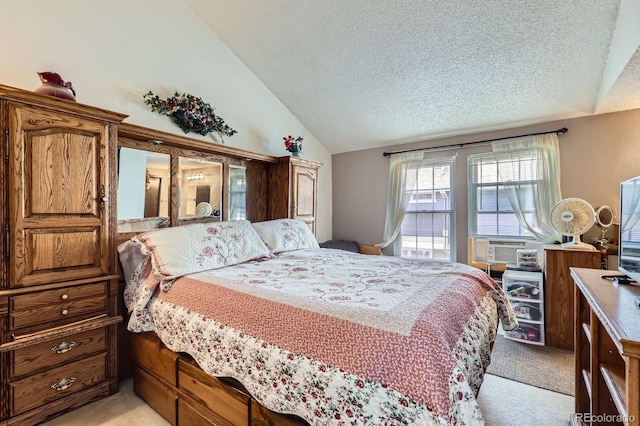 2072 S Helena St Unit B, Aurora, CO 80013 - bedroom featuring light carpet, a textured ceiling, and high vaulted ceiling