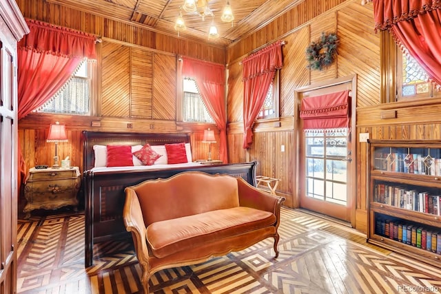 bedroom with wood walls