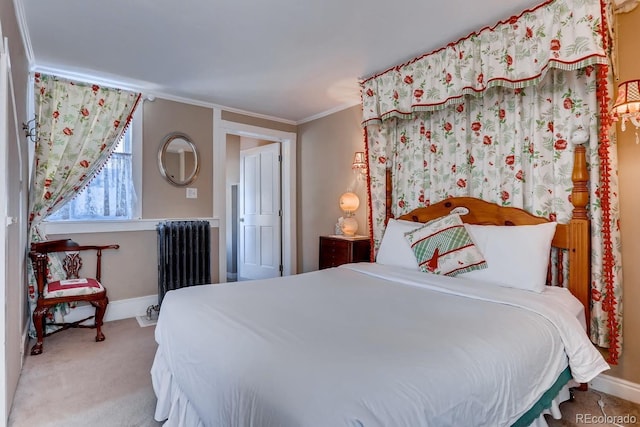 carpeted bedroom featuring radiator, baseboards, and ornamental molding