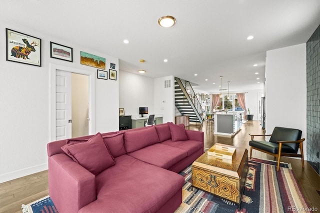 living room with light hardwood / wood-style floors