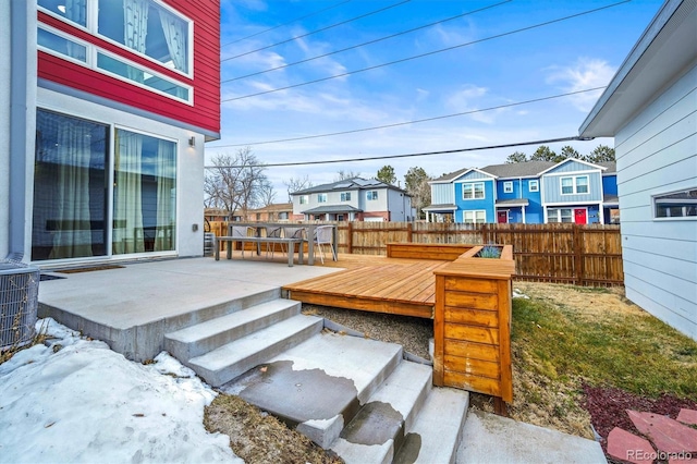 view of patio featuring central AC unit and a deck