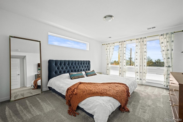 bedroom featuring carpet floors and access to outside