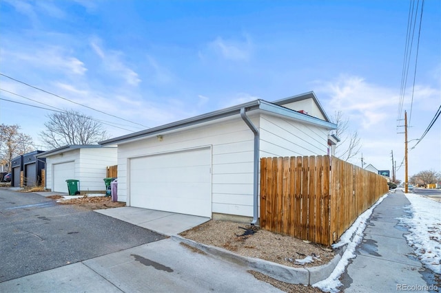 view of property exterior featuring a garage