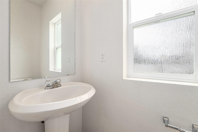 5572 Killarney St, Denver, CO 80249 - bathroom featuring a sink
