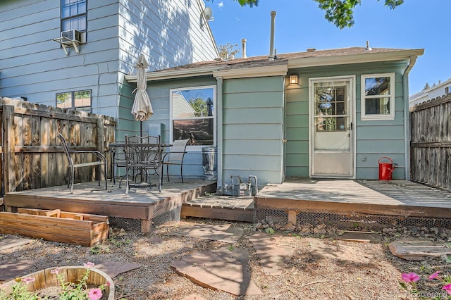 8168 Washington St Unit 46, Denver, CO 80229 - rear view of house with a deck and outdoor dining space