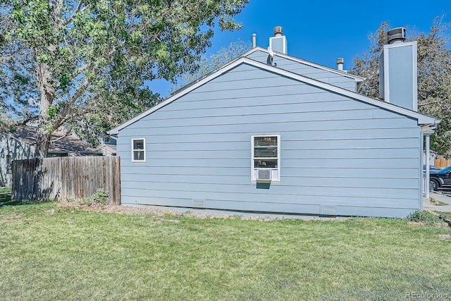 8168 Washington St Unit 46, Denver, CO 80229 - view of side of property featuring a chimney
