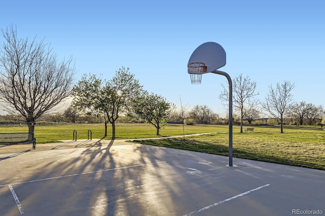 view of sport court with community basketball court and a lawn