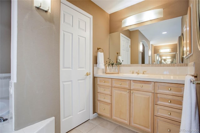 bathroom with vanity and tile patterned floors