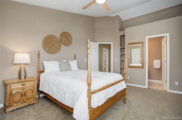 bedroom featuring light carpet and ceiling fan