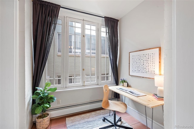 tiled home office featuring baseboard heating