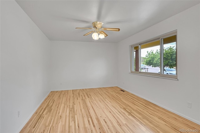 1304 De Reamer Cir, Colorado Springs, CO 80915 - spare room with baseboards, wood finished floors, and ceiling fan