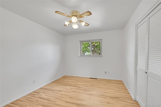 1304 De Reamer Cir, Colorado Springs, CO 80915 - unfurnished bedroom featuring light wood-style flooring, a closet, baseboards, and a ceiling fan