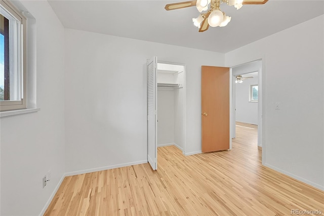 1304 De Reamer Cir, Colorado Springs, CO 80915 - unfurnished bedroom with light wood finished floors, baseboards, a closet, and a ceiling fan