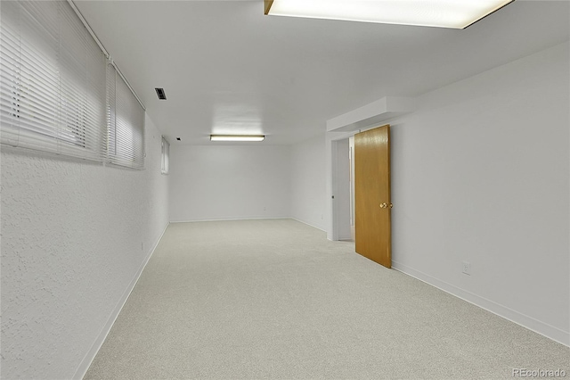1304 De Reamer Cir, Colorado Springs, CO 80915 - finished below grade area featuring carpet floors and baseboards