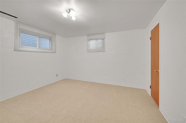 1304 De Reamer Cir, Colorado Springs, CO 80915 - below grade area with light colored carpet and baseboards