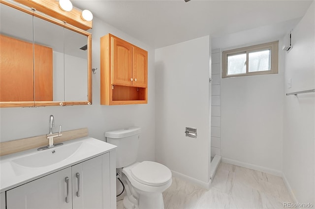 1304 De Reamer Cir, Colorado Springs, CO 80915 - full bathroom with marble finish flooring, toilet, vanity, a shower, and baseboards