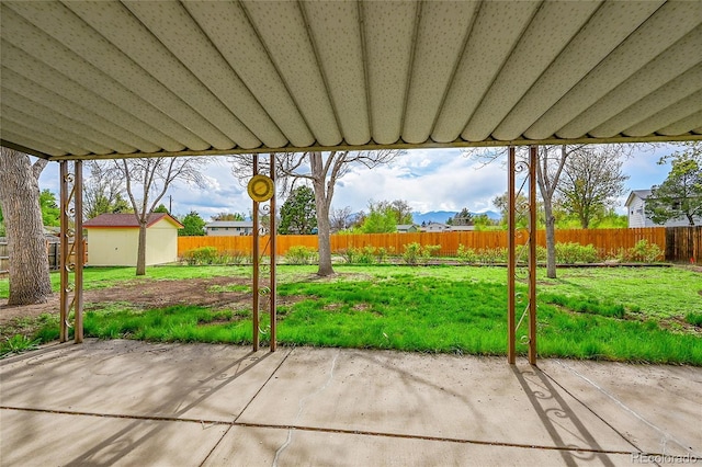 1304 De Reamer Cir, Colorado Springs, CO 80915 - view of patio / terrace featuring a storage shed and an outdoor structure
