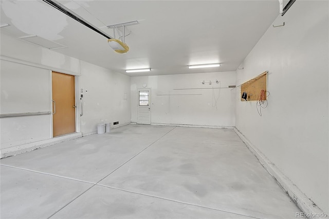 1304 De Reamer Cir, Colorado Springs, CO 80915 - garage featuring a garage door opener