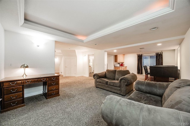 living room featuring recessed lighting, a raised ceiling, and carpet floors