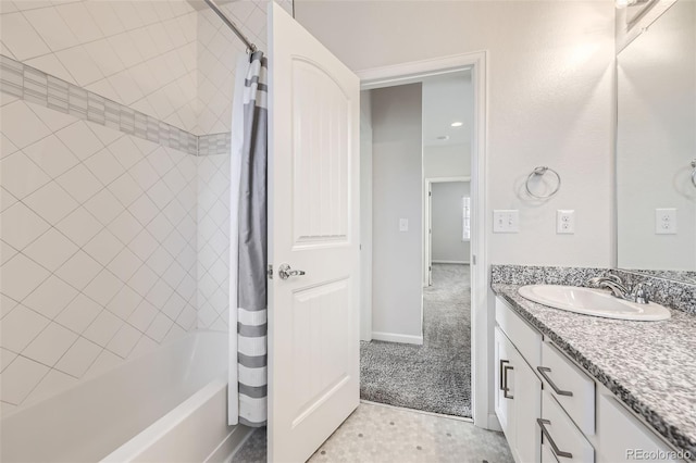 full bathroom with shower / bath combo and vanity
