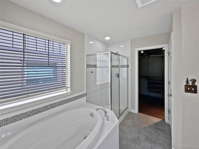 bathroom featuring a shower stall, a bath, visible vents, and recessed lighting