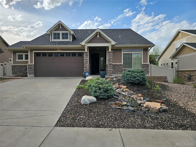 craftsman inspired home with a garage