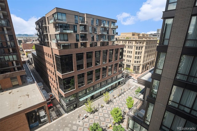 view of building exterior featuring a view of city